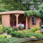 Lugarde Summerhouse Prima Lilly PL16 is a flat roofed summerhouse with a spacious adjacent patio. One semi open wall and one fully open wall provide a fantastic view of your garden while the lockable indoor are keeps your garden furniture safe and dry.